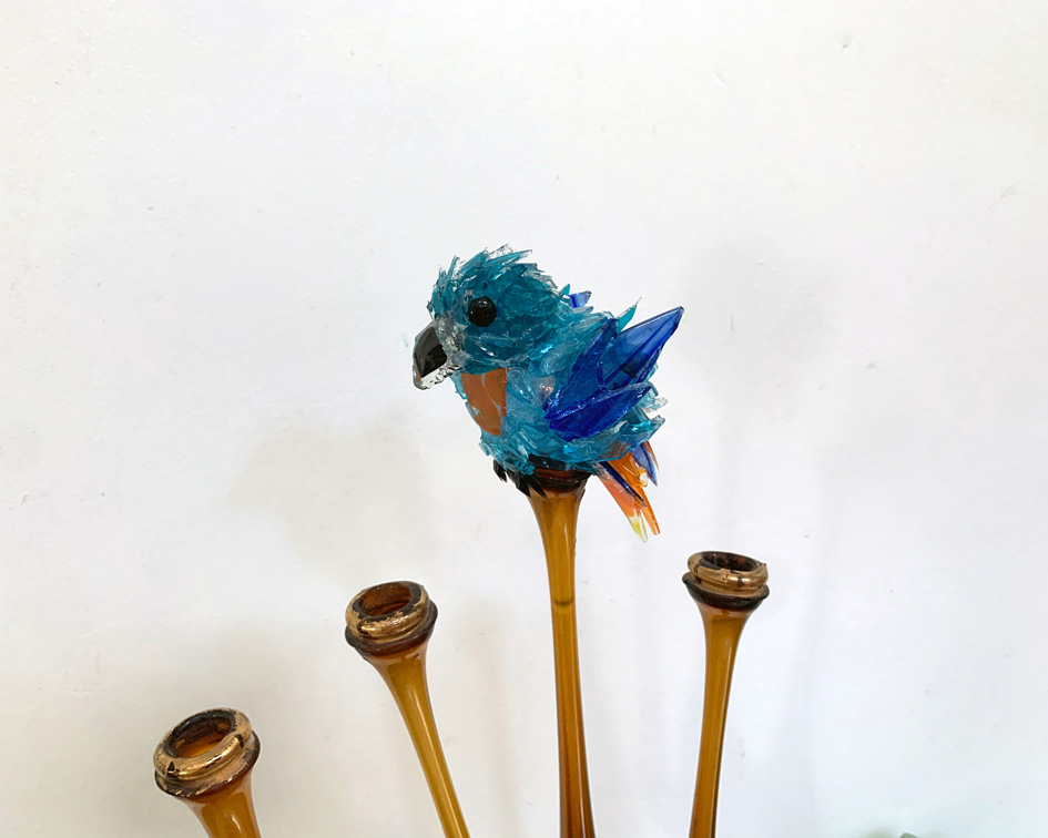 Itsy Turquoise bird on melted stand glass sculpture